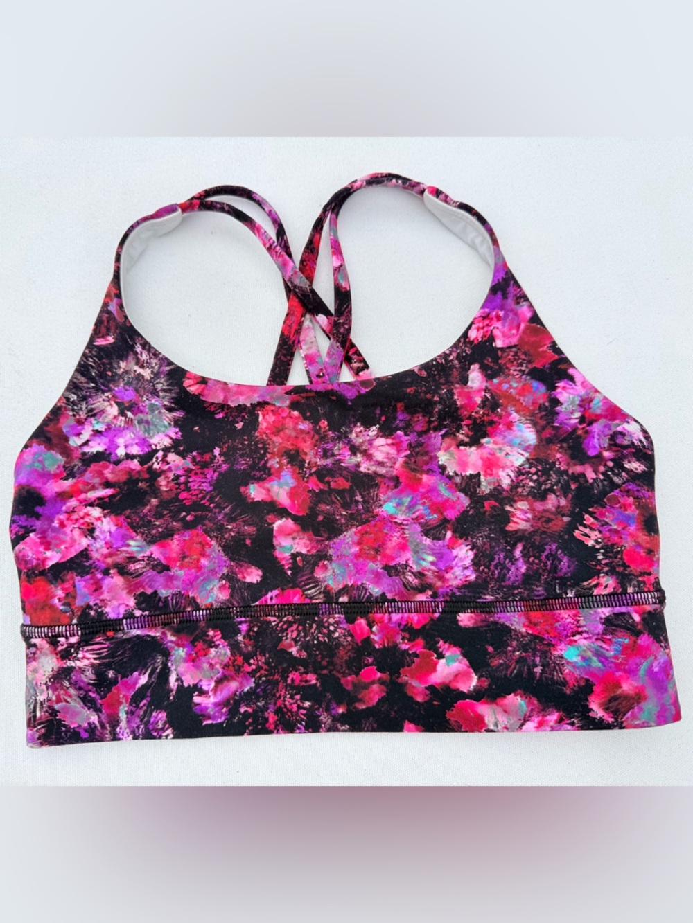 lululemon athletica Energy Bra Long Line in the Fluoro Floral Multi pattern.